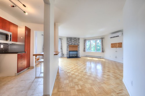 Vue d'ensemble - 201-2050 Rue De Magenta, Laval (Vimont), QC - Indoor With Fireplace