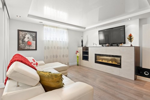 Family Room - 3996 Rue Sylvia-Daoust, Québec (Sainte-Foy/Sillery/Cap-Rouge), QC - Indoor Photo Showing Living Room With Fireplace