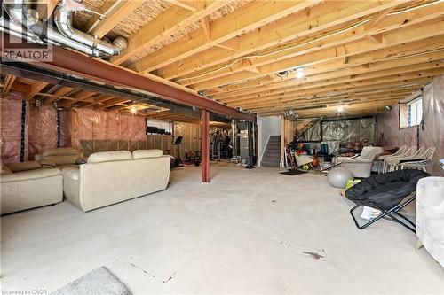 Spacious unfinished basement offering extensive potential for customization - 130 Pondcliffe Drive, Kitchener, ON - Indoor Photo Showing Basement