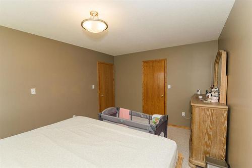 15078 Rd 31N Road, Dufferin, MB - Indoor Photo Showing Bedroom