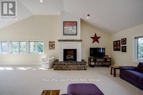 230 Ecclestone Drive, Bracebridge, ON - Indoor Photo Showing Living Room With Fireplace