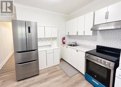 200 - 1918A QUEEN STREET E , Toronto, Ontario M4L 1H5 2