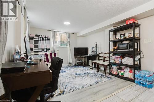 Recessed lighting, light-toned walls, and wood-finish flooring - 67 Kinzie Avenue, Kitchener, ON - Indoor