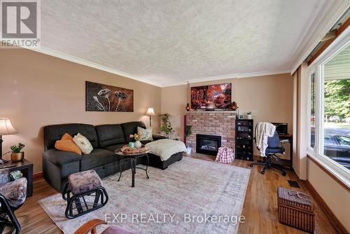 1304 Leonard Avenue, Cornwall, ON - Indoor Photo Showing Living Room With Fireplace