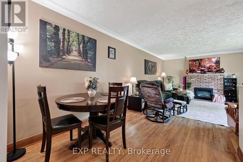 1304 Leonard Avenue, Cornwall, ON - Indoor Photo Showing Dining Room With Fireplace