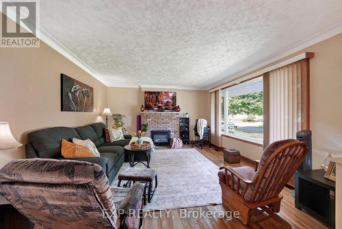 1304 Leonard Avenue, Cornwall, ON - Indoor Photo Showing Living Room With Fireplace