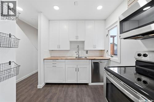 1519 C Avenue N, Saskatoon, SK - Indoor Photo Showing Kitchen With Double Sink