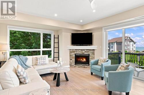 464 Mariners Way, Collingwood, ON - Indoor Photo Showing Living Room With Fireplace