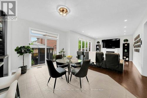 14 Atchison Drive, Caledon, ON - Indoor Photo Showing Dining Room With Fireplace
