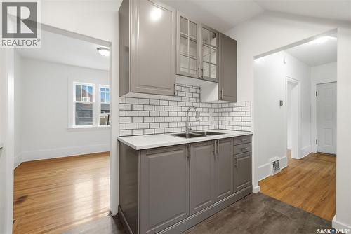 1209 14Th Avenue, Regina, SK - Indoor Photo Showing Kitchen With Double Sink