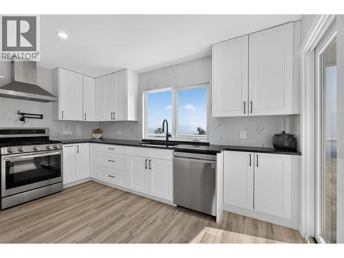With incredible views from the sink - 3491 Fenton Road, West Kelowna, BC - Indoor Photo Showing Kitchen