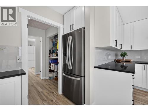 Large pantry nearby - 3491 Fenton Road, West Kelowna, BC - Indoor Photo Showing Other Room