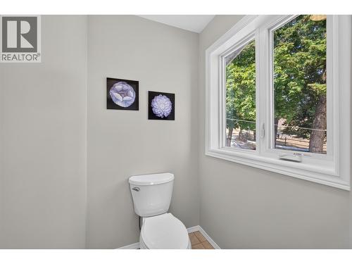 Primary ensuite with soaker tub & a walk-in shower - 3491 Fenton Road, West Kelowna, BC - Indoor Photo Showing Other Room