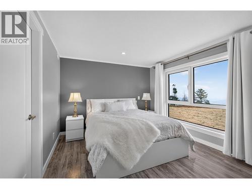 Third bedroom on the lower level - 3491 Fenton Road, West Kelowna, BC - Indoor Photo Showing Bedroom