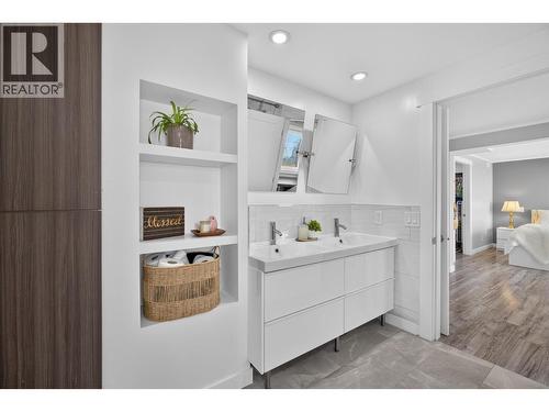 Full bathroom on the lower level - 3491 Fenton Road, West Kelowna, BC - Indoor Photo Showing Laundry Room