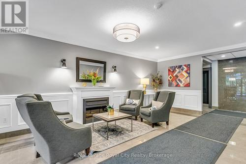 301 - 60 Wyndham Street S, Guelph (St. Patrick'S Ward), ON - Indoor With Fireplace