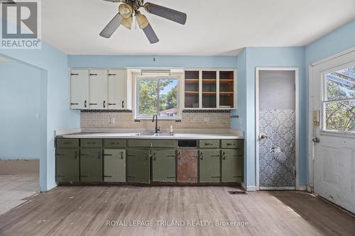 10207 Ivan Drive, Middlesex Centre, ON - Indoor Photo Showing Kitchen With Double Sink