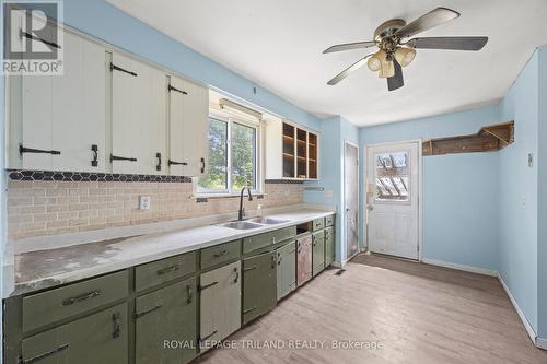 10207 Ivan Drive, Middlesex Centre, ON - Indoor Photo Showing Kitchen With Double Sink