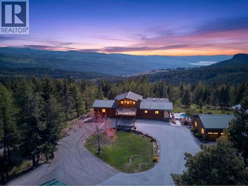 Featuring a home, a detached shop, an outbuilding & lots of land for usage - 7319 Trapper Court, Kelowna, BC - Outdoor With View