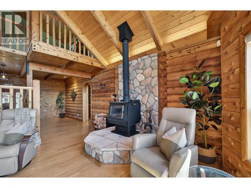 7319 Trapper Court, Kelowna, BC - Indoor Photo Showing Living Room With Fireplace