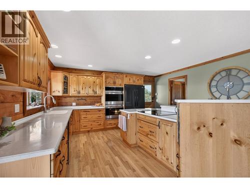Spacious kitchen with big island - 7319 Trapper Court, Kelowna, BC - Indoor Photo Showing Kitchen