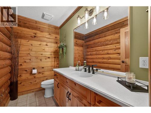 Powder room - 7319 Trapper Court, Kelowna, BC - Indoor Photo Showing Bathroom