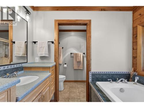 With a walk-in shower - 7319 Trapper Court, Kelowna, BC - Indoor Photo Showing Bathroom