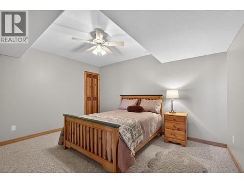 7319 Trapper Court, Kelowna, BC - Indoor Photo Showing Bedroom