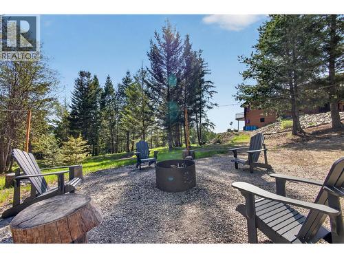 Fire pit - 7319 Trapper Court, Kelowna, BC - Outdoor With Deck Patio Veranda