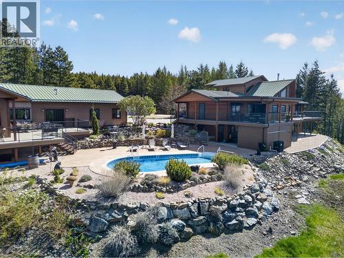 Set up to be your own private retreat - 7319 Trapper Court, Kelowna, BC - Outdoor With In Ground Pool With Deck Patio Veranda