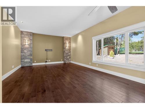 Legal outbuilding with non-conforming kitchen - 7319 Trapper Court, Kelowna, BC - Indoor Photo Showing Other Room