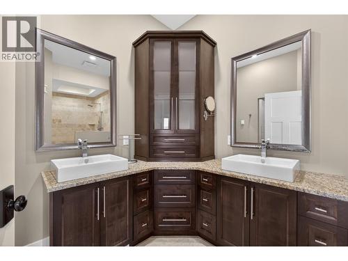Legal outbuilding with non-conforming kitchen - 7319 Trapper Court, Kelowna, BC - Indoor Photo Showing Bathroom