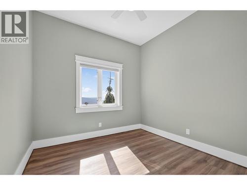 Legal outbuilding with non-conforming kitchen - 7319 Trapper Court, Kelowna, BC - Indoor Photo Showing Other Room