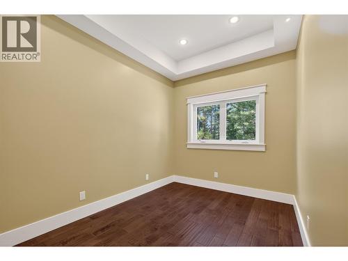 Legal outbuilding with non-conforming kitchen - 7319 Trapper Court, Kelowna, BC - Indoor Photo Showing Other Room