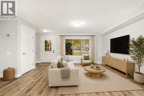 Digitally Staged Furniture, decor and window coverings. - 1651 Lynrick Road Unit# 105, Kelowna, BC - Indoor Photo Showing Living Room