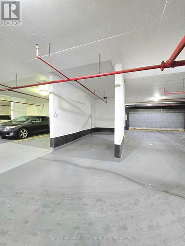Level 1 - Uph 01 - 88 Times Avenue, Markham, ON - Indoor Photo Showing Garage