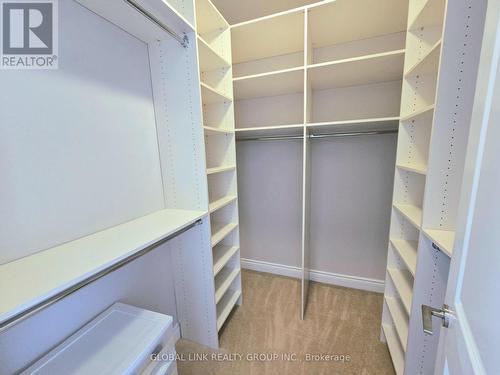 Primary BR walk-in closet - Uph 01 - 88 Times Avenue, Markham, ON - Indoor With Storage