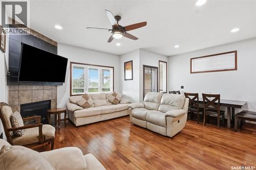 206 Muzyka Road, Saskatoon, SK - Indoor Photo Showing Living Room With Fireplace