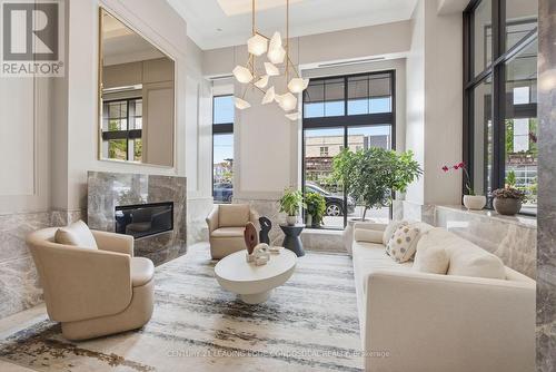 Lobby - 503 - 1 Strathgowan Avenue, Toronto, ON - Indoor Photo Showing Living Room With Fireplace