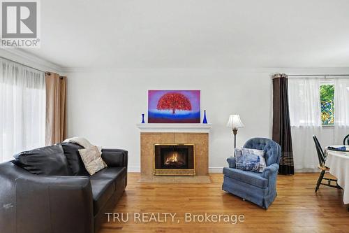 1908 Saunderson Drive, Ottawa, ON - Indoor Photo Showing Living Room With Fireplace