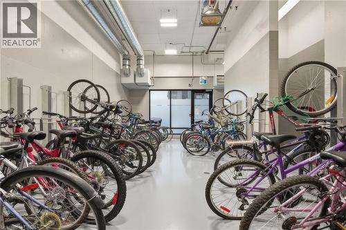 Dedicated bicycle storage area with wall-mounted racks - 251 Northfield Drive E Unit# 312, Waterloo, ON 