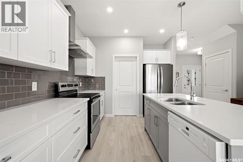 3886 Gee Crescent, Regina, SK - Indoor Photo Showing Kitchen With Double Sink With Upgraded Kitchen