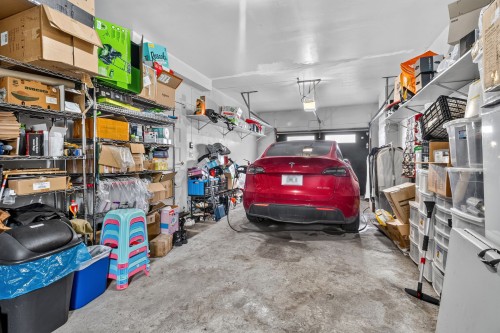 Garage - 407 Ch. Des Prairies, Brossard, QC - Indoor Photo Showing Garage