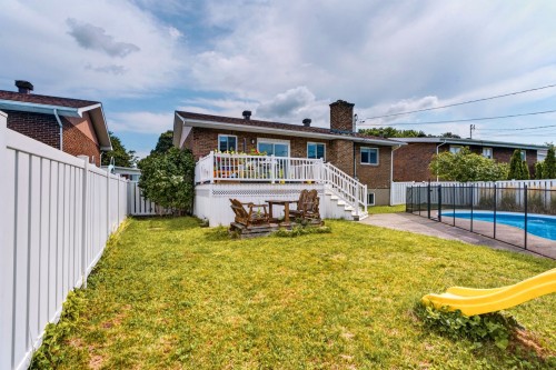 Cour - 3255 Rue Beaulieu, Brossard, QC - Outdoor With In Ground Pool With Deck Patio Veranda