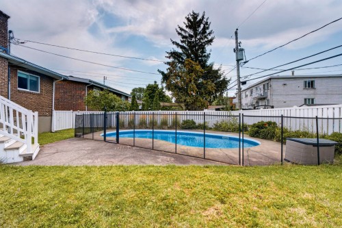 Cour - 3255 Rue Beaulieu, Brossard, QC - Outdoor With In Ground Pool