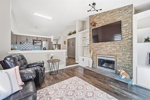 104 Copperstone Cr, Winnipeg, MB - Indoor Photo Showing Living Room With Fireplace