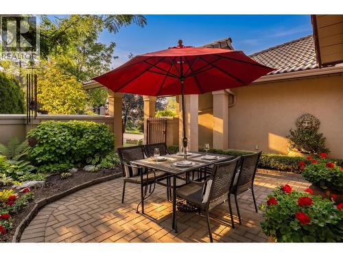 Setting sun in courtyard. - 4400 Gallaghers Drive E Unit# 2, Kelowna, BC - Outdoor With Deck Patio Veranda
