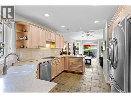 Kitchen with updated appliances. - 4400 Gallaghers Drive E Unit# 2, Kelowna, BC - Indoor Photo Showing Kitchen With Double Sink With Upgraded Kitchen
