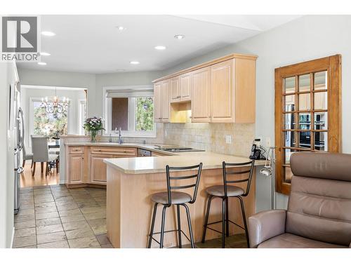 Counter sitting. - 4400 Gallaghers Drive E Unit# 2, Kelowna, BC - Indoor Photo Showing Kitchen With Double Sink