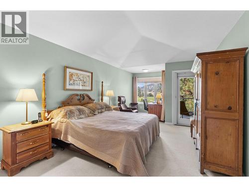 Large main floor primary bedroom. - 4400 Gallaghers Drive E Unit# 2, Kelowna, BC - Indoor Photo Showing Bedroom